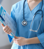 A nurse holding a clipboard