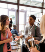 Three people talking in a group