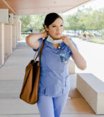 A nurse walks outside