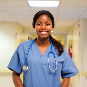 A nurse standing in a hallway